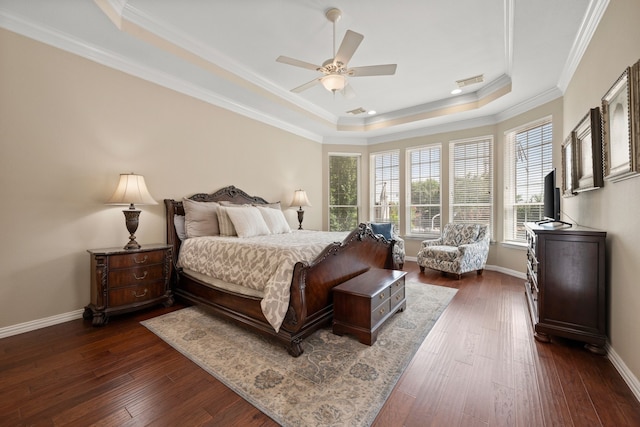 4013 Tulane St, Flower Mound, TX 75022 - bedroom with a tray ceiling, crown molding, dark wood-type flooring, and baseboards