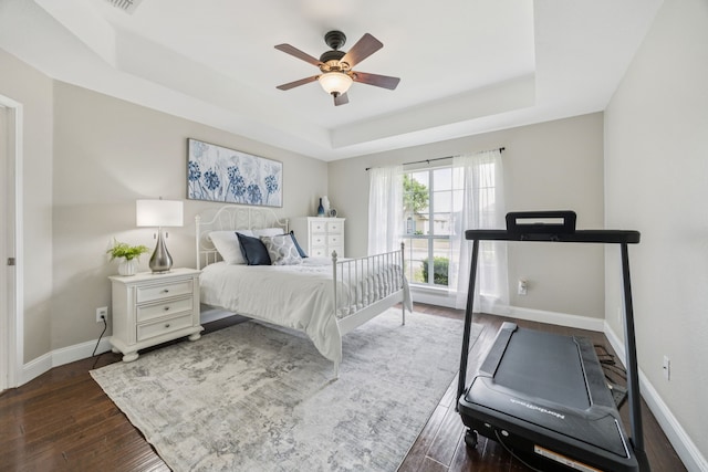 1532 Streams Way, Allen, TX 75002 - bedroom featuring a raised ceiling, wood finished floors, baseboards, and ceiling fan