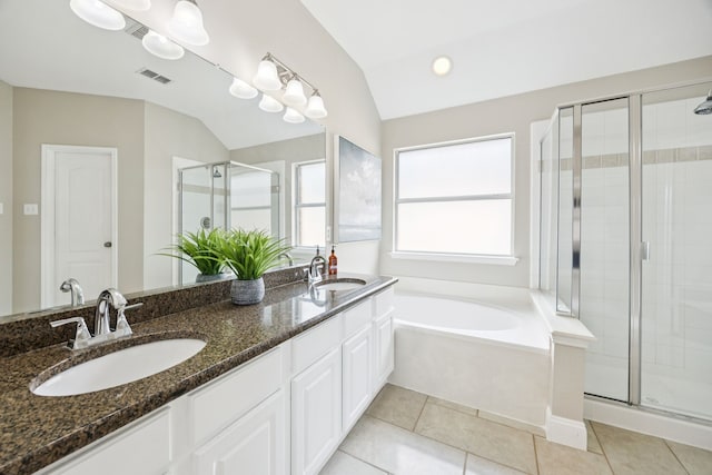 1532 Streams Way, Allen, TX 75002 - bathroom featuring a stall shower, lofted ceiling, double vanity, a garden tub, and tile patterned floors