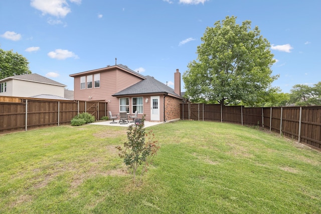 1532 Streams Way, Allen, TX 75002 - rear view of property featuring a chimney, a patio, brick siding, and a shingled roof