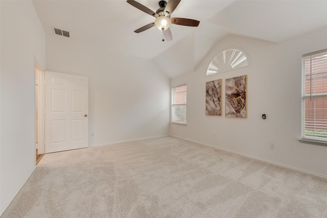5644 Overland Dr, The Colony, TX 75056 - empty room featuring a ceiling fan, light colored carpet, healthy amount of natural light, and lofted ceiling