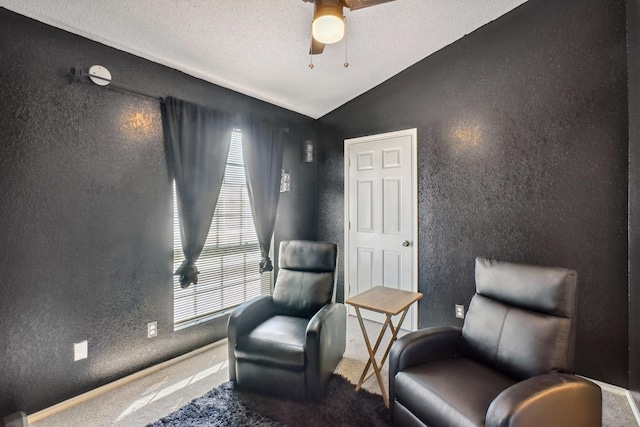 3017 Deanne Ct, Fort Worth, TX 76123 - living area featuring carpet floors, lofted ceiling, a ceiling fan, and a textured wall