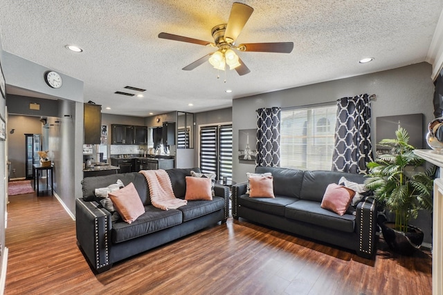 3017 Deanne Ct, Fort Worth, TX 76123 - living area featuring wood finished floors, a textured ceiling, a ceiling fan, and recessed lighting