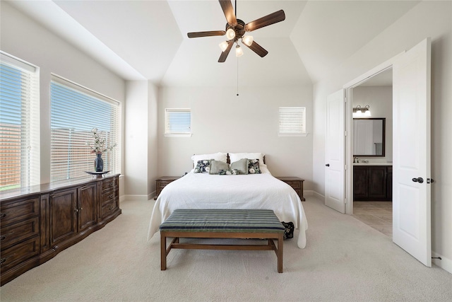 8670 Soto Ln, Frisco, TX 75036 - bedroom with light colored carpet, vaulted ceiling, baseboards, and connected bathroom
