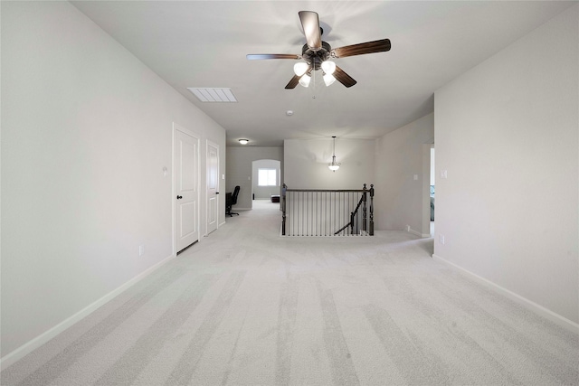 8670 Soto Ln, Frisco, TX 75036 - empty room featuring ceiling fan, light colored carpet, and baseboards