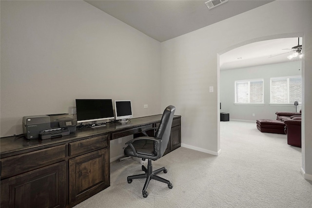 8670 Soto Ln, Frisco, TX 75036 - office area with light colored carpet, a ceiling fan, baseboards, arched walkways, and vaulted ceiling