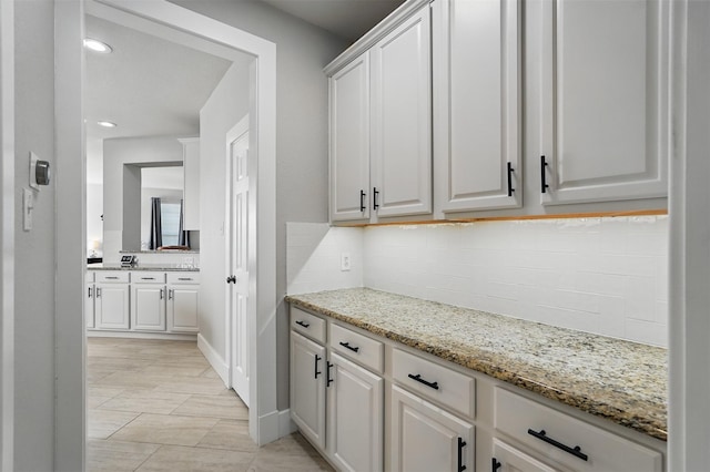 3752 Menard Dr, Carrollton, TX 75010 - bar area featuring decorative backsplash and recessed lighting