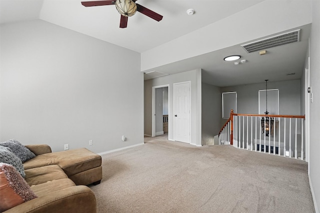 3752 Menard Dr, Carrollton, TX 75010 - sitting room with ceiling fan, baseboards, carpet flooring, attic access, and lofted ceiling