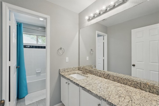3752 Menard Dr, Carrollton, TX 75010 - bathroom with vanity, tile patterned flooring, and baseboards