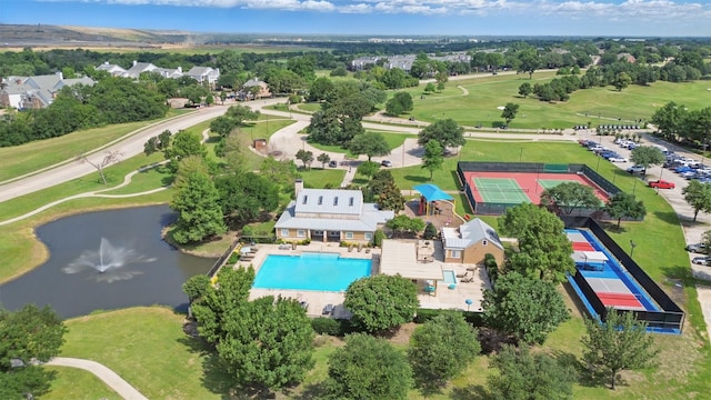 3752 Menard Dr, Carrollton, TX 75010 - aerial perspective of suburban area featuring a nearby body of water, a pool area, and a golf course