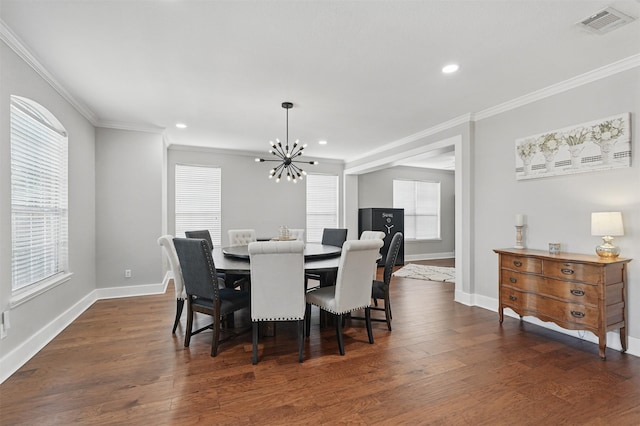 3752 Menard Dr, Carrollton, TX 75010 - dining space with a chandelier, ornamental molding, baseboards, recessed lighting, and dark wood-type flooring