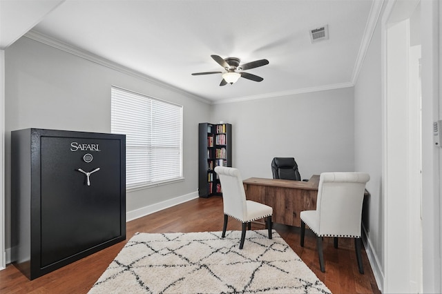 3752 Menard Dr, Carrollton, TX 75010 - home office featuring crown molding, a ceiling fan, dark wood-type flooring, and baseboards