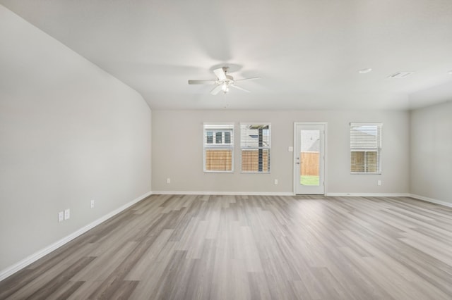 301 Sierra Rdg, Lavon, TX 75166 - unfurnished room featuring healthy amount of natural light, a ceiling fan, light wood-type flooring, and baseboards
