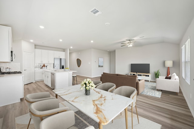 301 Sierra Rdg, Lavon, TX 75166 - dining area with light wood-style floors, a ceiling fan, recessed lighting, and baseboards