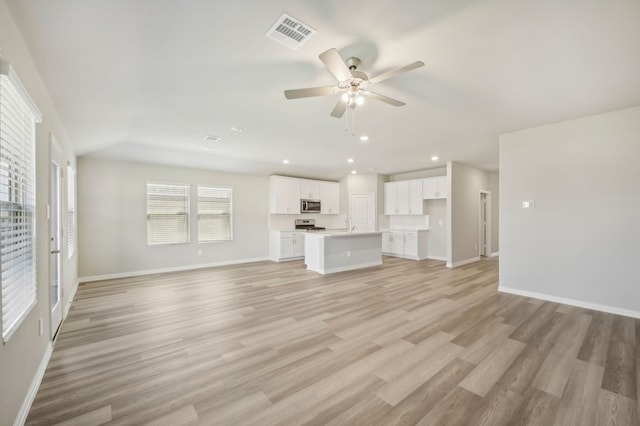 301 Sierra Rdg, Lavon, TX 75166 - unfurnished living room with ceiling fan, recessed lighting, baseboards, and light wood finished floors