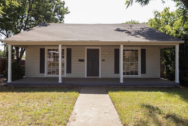 1109 Sayles Blvd, Abilene, TX 79605 - view of front of home featuring a porch and a shingled roof