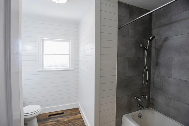 1109 Sayles Blvd, Abilene, TX 79605 - full bathroom with toilet, wood finished floors, tub / shower combination, and baseboards