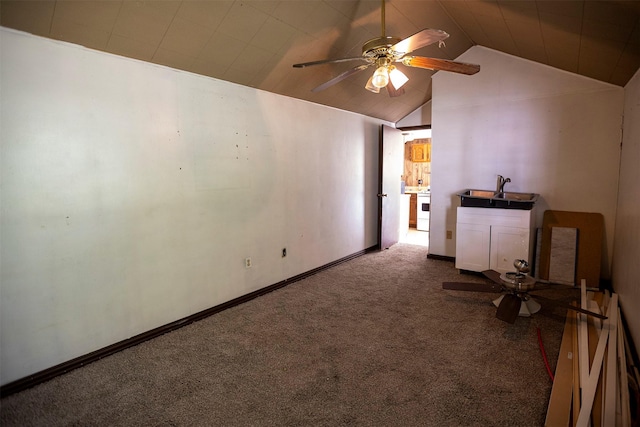1109 Sayles Blvd, Abilene, TX 79605 - unfurnished living room featuring carpet, vaulted ceiling, a ceiling fan, and a sink