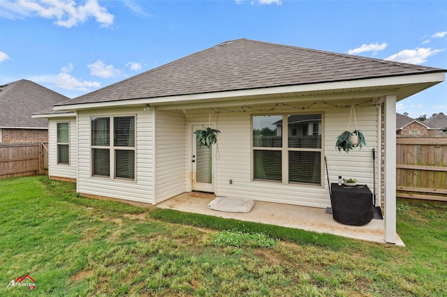 608 Ives Way, Haughton, LA 71037 - back of house featuring a shingled roof and a patio area