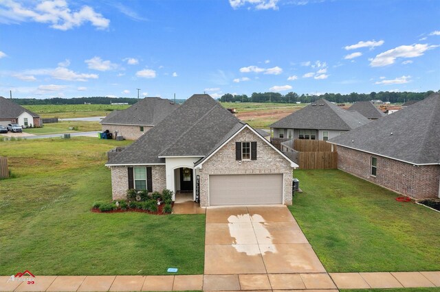 608 Ives Way, Haughton, LA 71037 - view of front of house with brick siding, a shingled roof, concrete driveway, and a garage