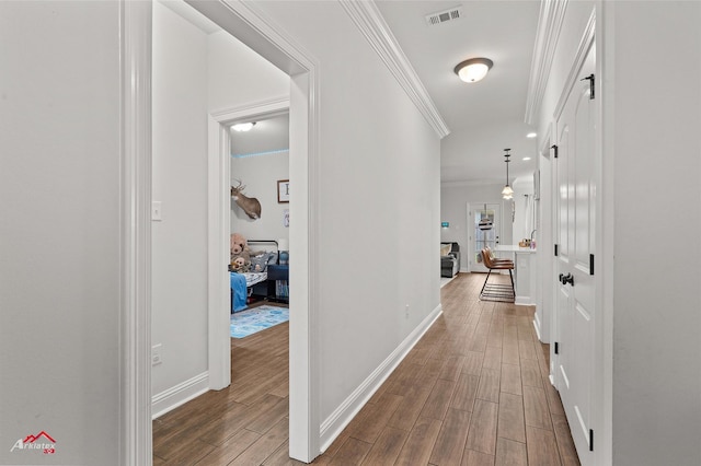 608 Ives Way, Haughton, LA 71037 - hall featuring wood finished floors, crown molding, and baseboards