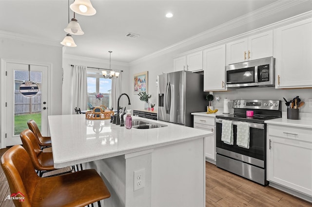 608 Ives Way, Haughton, LA 71037 - kitchen featuring stainless steel appliances, a sink, crown molding, and white cabinets