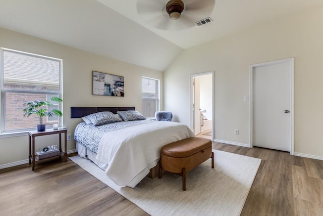 3137 Bent Oak Dr, Mesquite, TX 75181 - bedroom with wood finished floors, baseboards, vaulted ceiling, ceiling fan, and ensuite bathroom