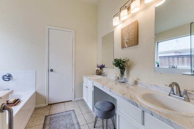 3137 Bent Oak Dr, Mesquite, TX 75181 - bathroom featuring double vanity, a garden tub, and tile patterned flooring