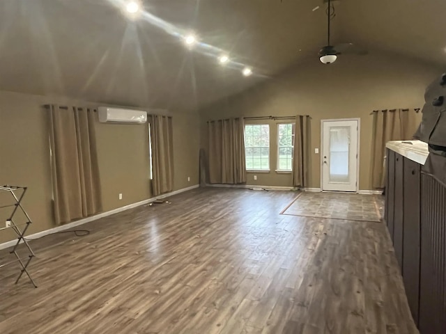 322 Farm Rd Unit 2283, Clarksville, TX 75426 - unfurnished living room with a wall mounted air conditioner, dark wood-style floors, baseboards, high vaulted ceiling, and ceiling fan