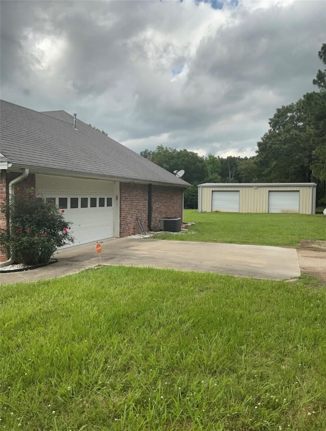 322 Farm Rd Unit 2283, Clarksville, TX 75426 - view of property exterior with driveway, brick siding, a lawn, cooling unit, and an outbuilding