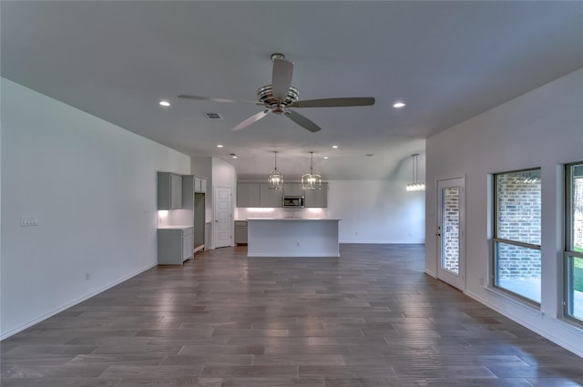 6817 Trail Rock, Benbrook, TX 76126 - unfurnished living room featuring ceiling fan, dark wood-style flooring, baseboards, and recessed lighting