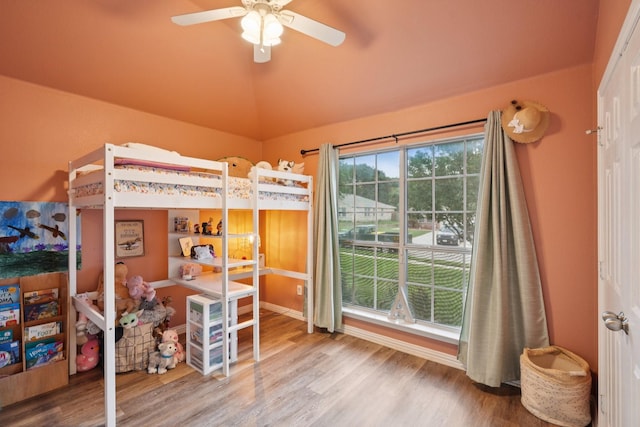 2408 Buffalo Run, Burleson, TX 76028 - bedroom with lofted ceiling, wood finished floors, and ceiling fan