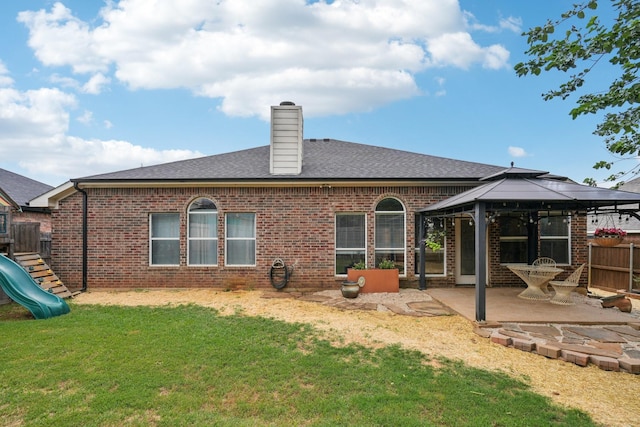 2408 Buffalo Run, Burleson, TX 76028 - rear view of house with a patio area, a playground, and brick siding