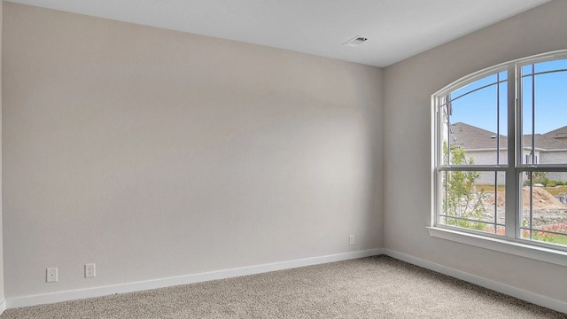1304 Cole Dr, Trenton, TX 75490 - spare room with baseboards and light carpet