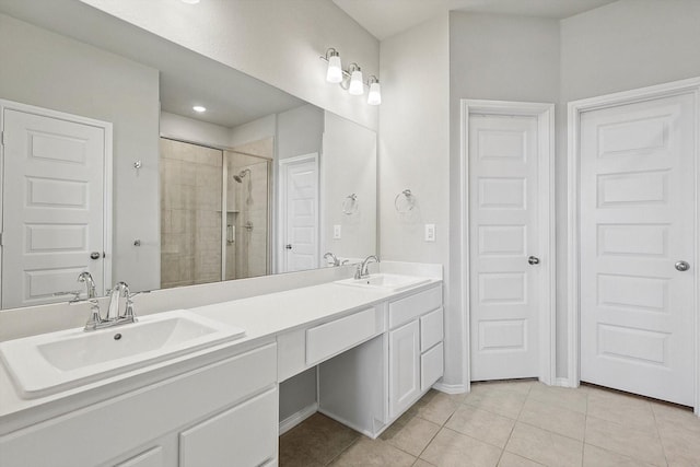 1608 Star Fleet Dr, Haslet, TX 76052 - bathroom featuring a shower stall, tile patterned floors, double vanity, and recessed lighting