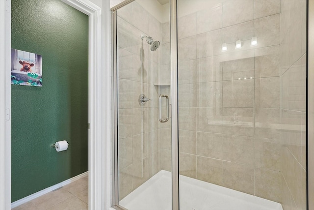 1608 Star Fleet Dr, Haslet, TX 76052 - bathroom featuring a shower stall, tile patterned flooring, and baseboards