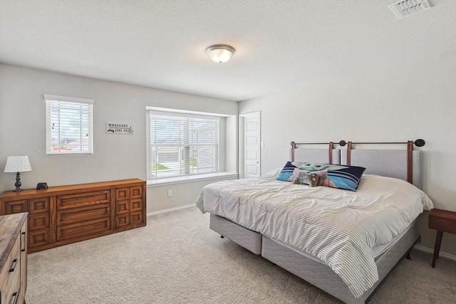 1608 Star Fleet Dr, Haslet, TX 76052 - carpeted bedroom featuring multiple windows and baseboards