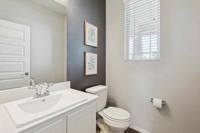 1608 Star Fleet Dr, Haslet, TX 76052 - half bath featuring toilet, vanity, and baseboards