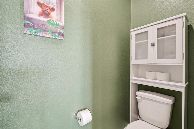 1608 Star Fleet Dr, Haslet, TX 76052 - bathroom featuring toilet and a textured wall