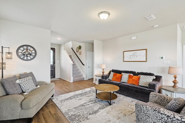 1608 Star Fleet Dr, Haslet, TX 76052 - living room featuring stairway, wood finished floors, and baseboards