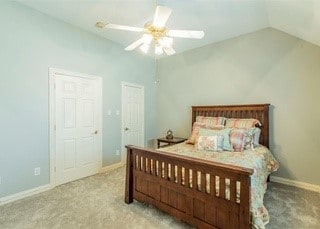 2909 Harkness Dr, Plano, TX 75093 - carpeted bedroom with vaulted ceiling, baseboards, and ceiling fan