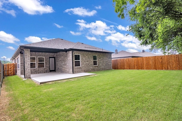 1524 Latimer Ct, Trenton, TX 75490 - rear view of property with a patio, brick siding, and a shingled roof
