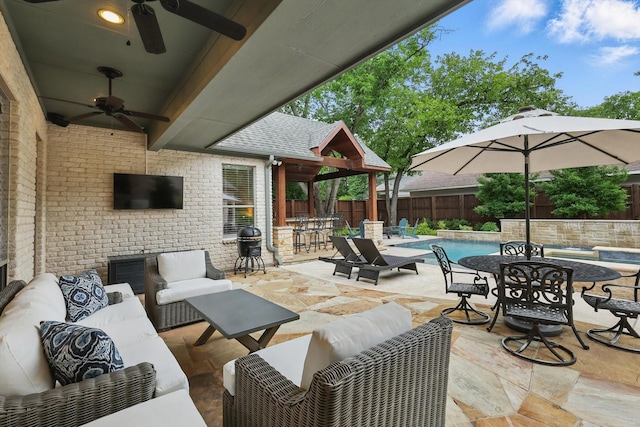 129 Shady Dale Ln, Coppell, TX 75019 - fenced backyard featuring outdoor lounge area, a ceiling fan, and a patio area