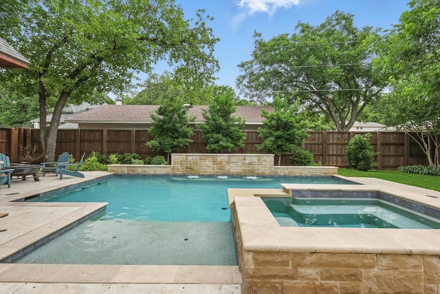 129 Shady Dale Ln, Coppell, TX 75019 - view of swimming pool with a patio area, a fenced backyard, and a pool with connected hot tub