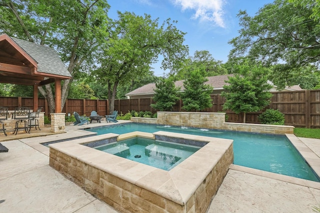 129 Shady Dale Ln, Coppell, TX 75019 - view of pool with a patio area, a fenced backyard, and a pool with connected hot tub