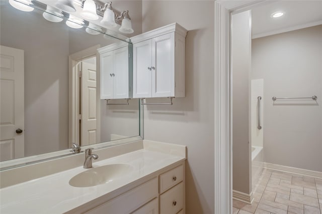 11240 Marsh Wren Cir, Flint, TX 75762 - bathroom with vanity, baseboards, and recessed lighting