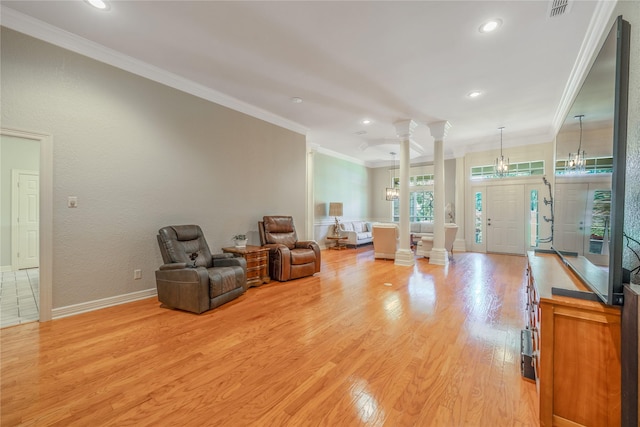 11240 Marsh Wren Cir, Flint, TX 75762 - living room with decorative columns, ornamental molding, light wood finished floors, baseboards, and recessed lighting