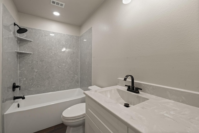 407 Charleston Park Dr, Woodway, TX 76712 - bathroom with toilet, vanity, tub / shower combination, wood finished floors, and recessed lighting
