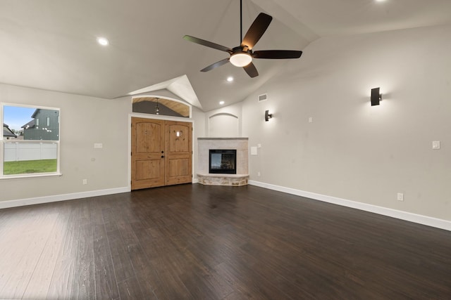 407 Charleston Park Dr, Woodway, TX 76712 - unfurnished living room featuring lofted ceiling, a ceiling fan, baseboards, wood finished floors, and a stone fireplace