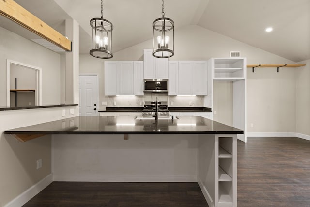 407 Charleston Park Dr, Woodway, TX 76712 - kitchen with appliances with stainless steel finishes, open shelves, dark countertops, decorative backsplash, and a sink